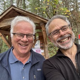 Scott Richardson and Gord Baird outside the community mailbox kiosk